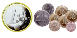 A one euro coin and a selection of mark coins